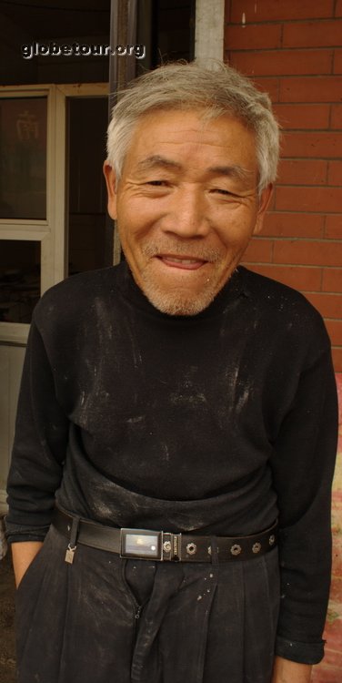 China, Xining, old man in market