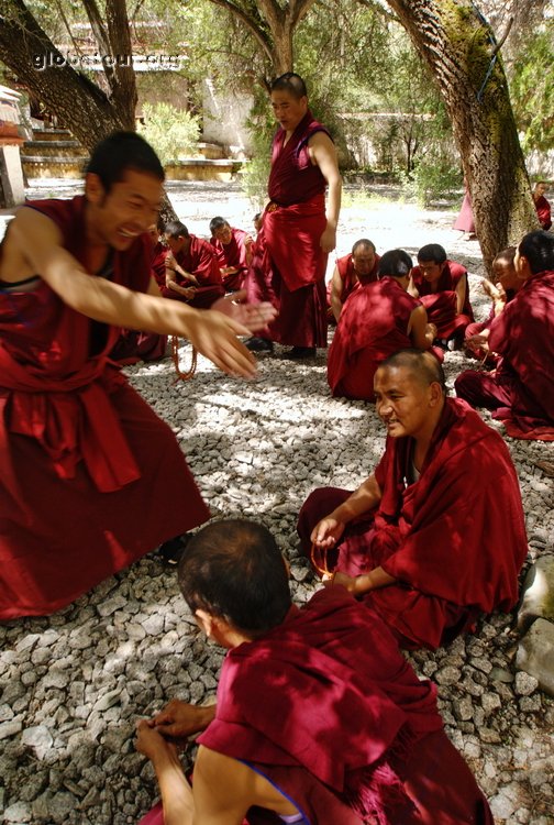 Tibet, Sera monastery, monks in debating courtyard