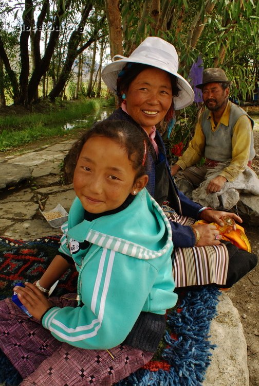 Tibet, family in water mill