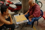 Vietnam,+Ho+Chi+Ming+City,+playing+chinesse+chess